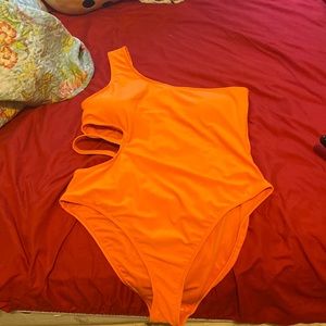 Bright orange one piece bathing suit